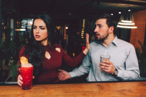 A couple sitting in a bar